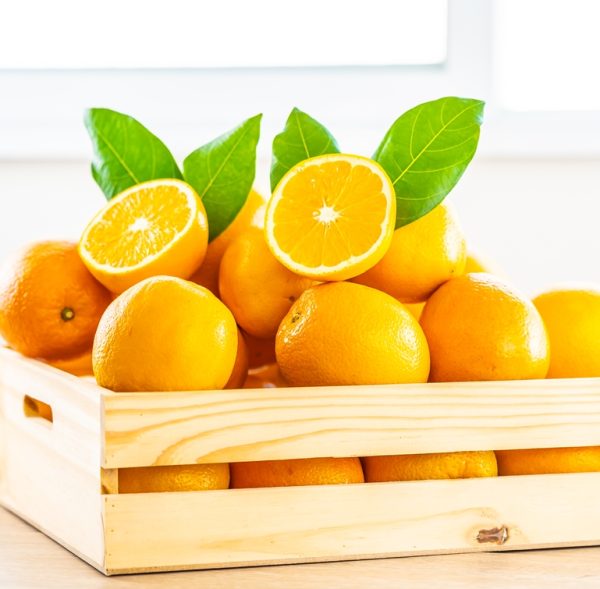 Fresh oranges fruit on wood table - Healthy food concept